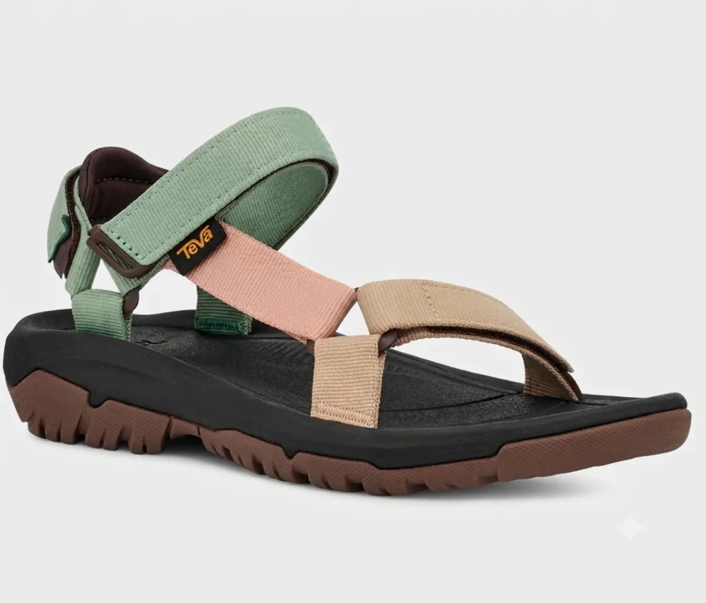 Teva Hurricane XLT2 women's hiking sandal with Velcro straps on a rocky trail